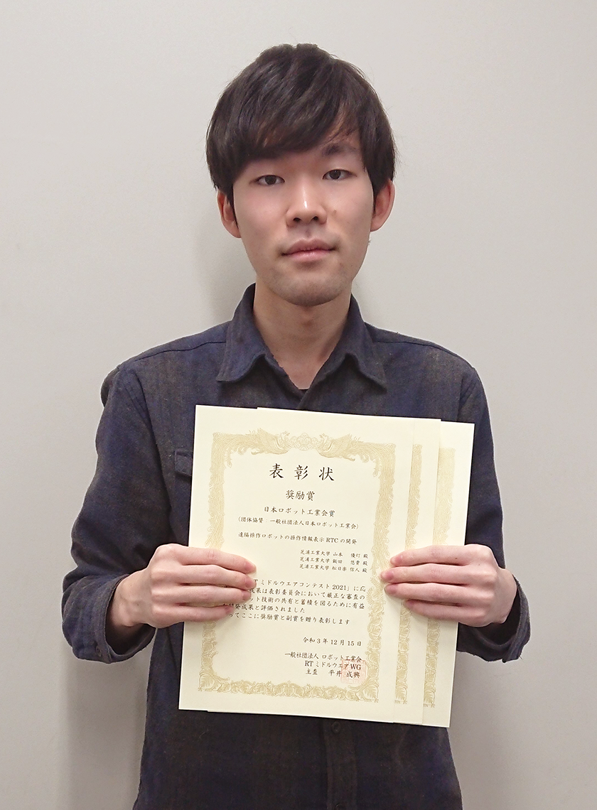 受賞本文写真_山本さん